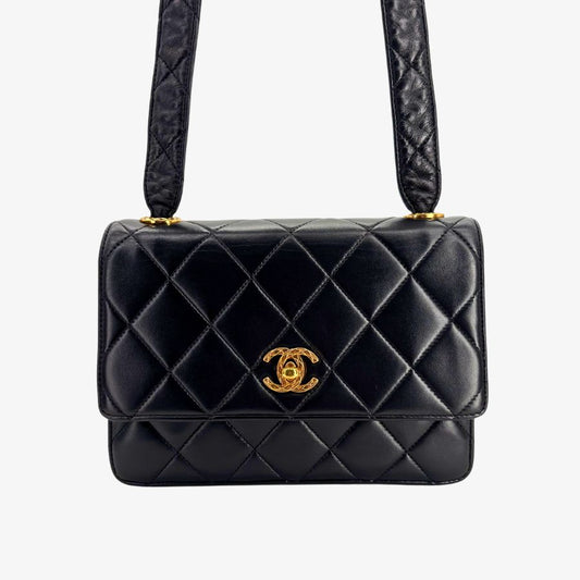 RG589 - CHANEL Vintage Black Lambskin Flap Bag