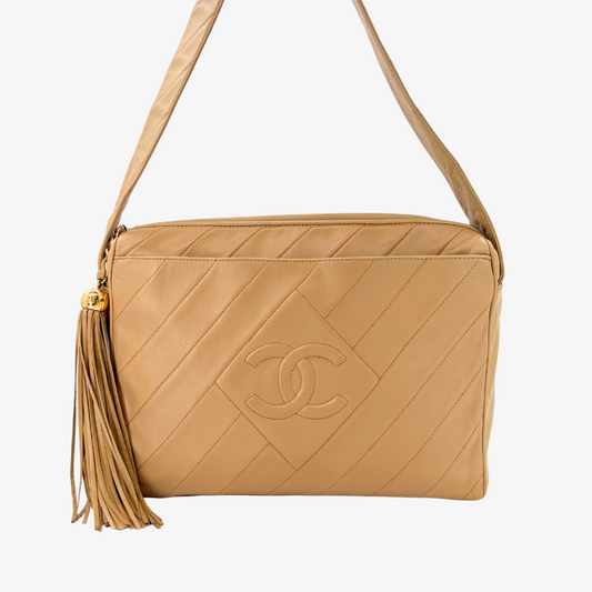 JZ752 - CHANEL Vintage Beige Lambskin Diagonal Stich CC Tassel Camera Bag