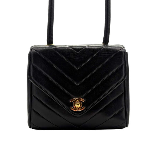 RG050 - CHANEL Vintage Black Lambskin Chevron Flap Bag