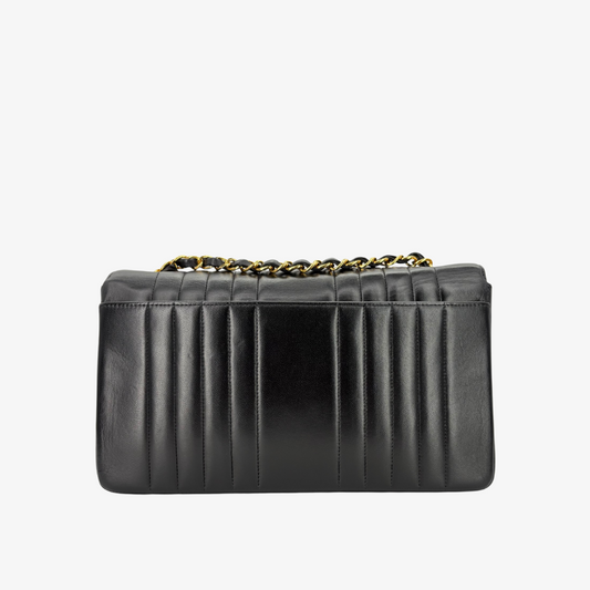 CS010 - CHANEL Vintage Black Lambskin Vertical Flap Bag