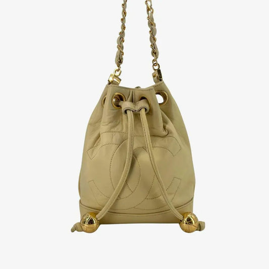 jw565-chanel-vintage-beige-lambskin-golden-ball-mini-bucket-bag