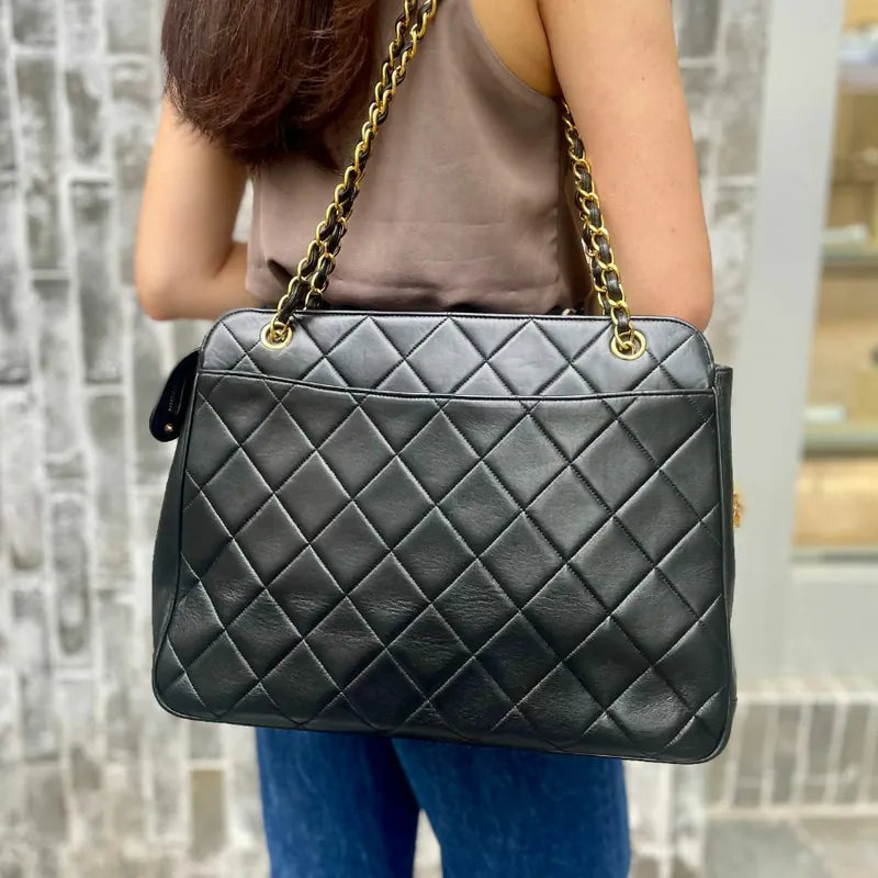 JU709 - CHANEL Vintage Black Lambskin Sun Flower Charm Tote Bag