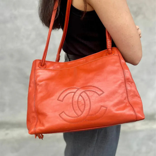 jah171-chanel-vintage-orange-lambskin-embossed-logo-tote-bag