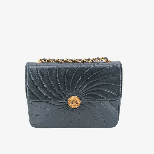 jt341-chanel-vingate-black-lambskin-spiral-flap-bag