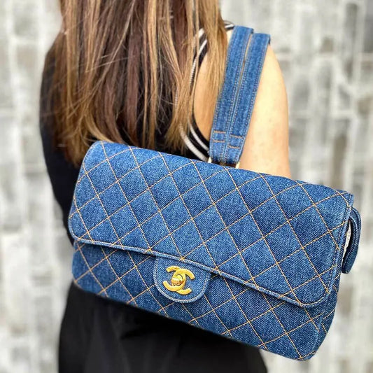 90129699-chanel-vintage-blue-denim-flap-backpack