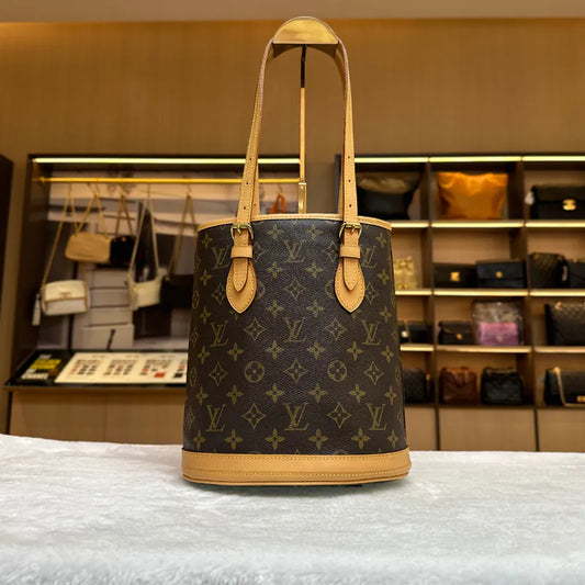 jw236-louis-vuitton-vintage-petite-monogram-bucket-bagrepaired-item