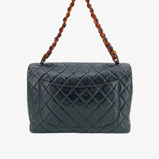 90201269-chanel-vintage-black-lambskin-tortoiseshell-quilted-flap-bag