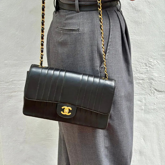 RG014 - CHANEL Vintage Black Lambskin Vertical Flap Bag