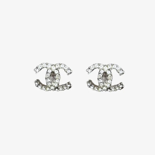 RE608 - CHANEL Silver CC Logo Crystal Earrings