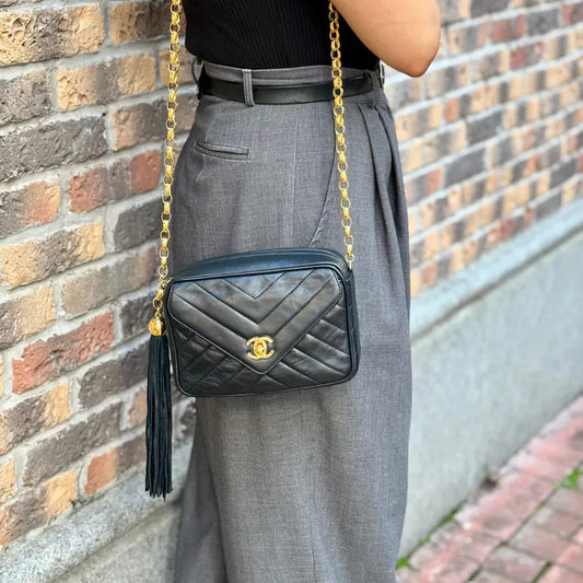 RE972 - CHANEL Vintage Navy Lambskin Chevron Gold Chain Camera Bag