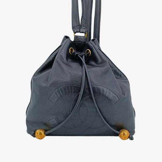 ra753-chanel-vintage-black-lambskin-drawstring-backpack