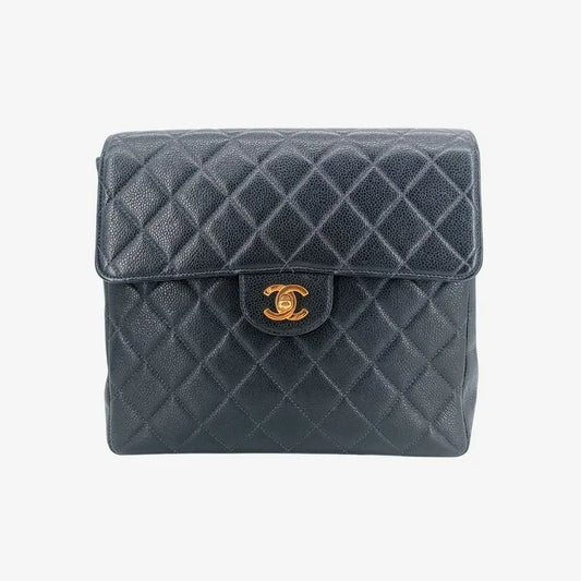90179080-chanel-vintage-navy-caviar-leather-square-flap-backpack
