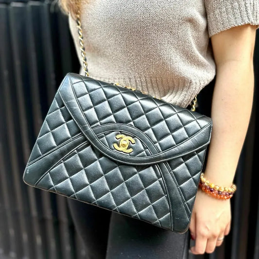 c446-chanel-vintage-black-lambskin-quilted-flap-bag