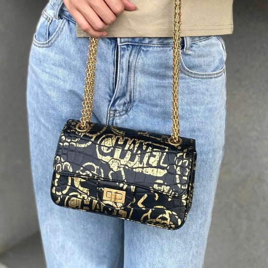 90190312-chanel-black-and-gold-graffiti-calfskin-crocodile-embossed-255-flap-bag