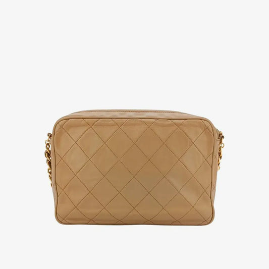 jah173-chanel-vintage-beige-lambskin-tassel-camera-bag