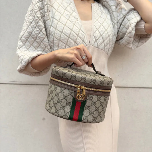 c571-gucci-brown-canvas-monogram-vanity-case