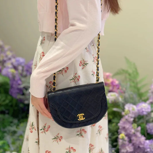 RC319 - CHANEL Vintage Black Lambskin Half Moon Flap Bag