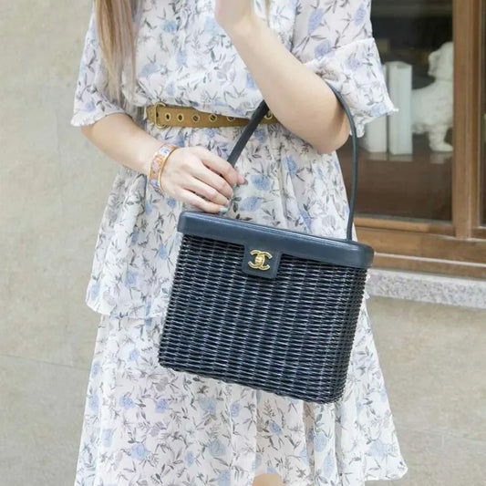 jq903-chanel-vintage-navy-rattan-flap-handbag
