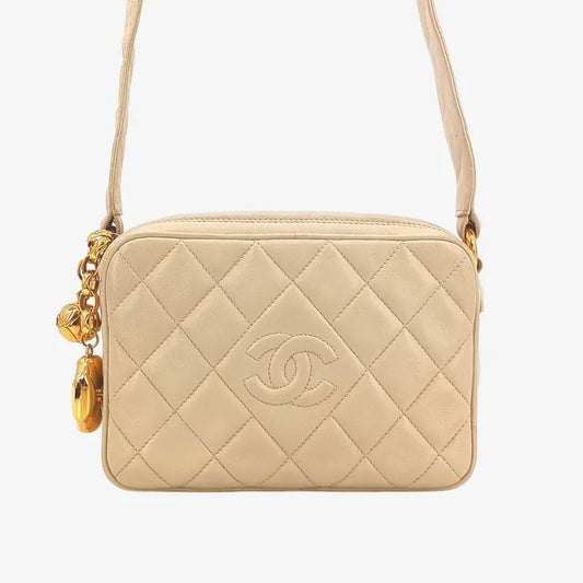 jt051-chanel-vintage-beige-lambskin-quilted-camera-bag