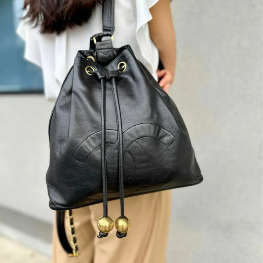 ra753-chanel-vintage-black-lambskin-drawstring-backpack