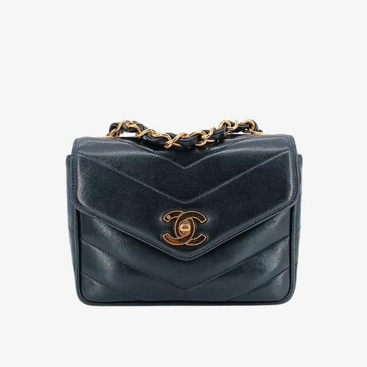 c407-chanel-vintage-navy-lambskin-chevron-mini-flap-bag