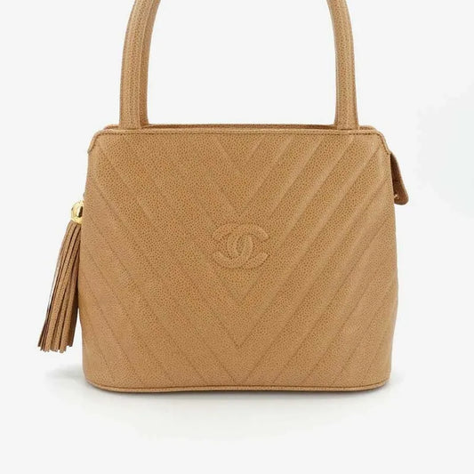 jr876-chanel-vintage-beige-caviar-leather-handbag