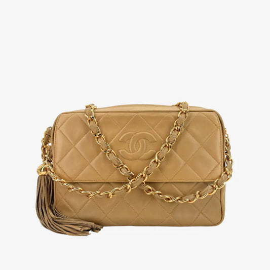 RE650 - CHANEL Vintage Beige Lambskin Tassel Camera Bag