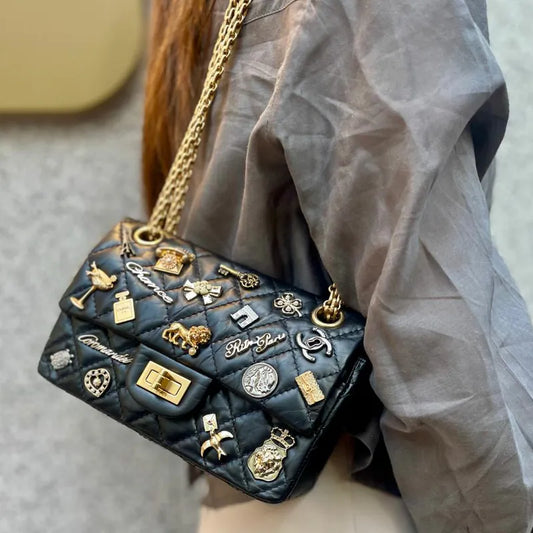 90236760-chanel-black-calfskin-255-reissue-lucky-charm-flap-bag