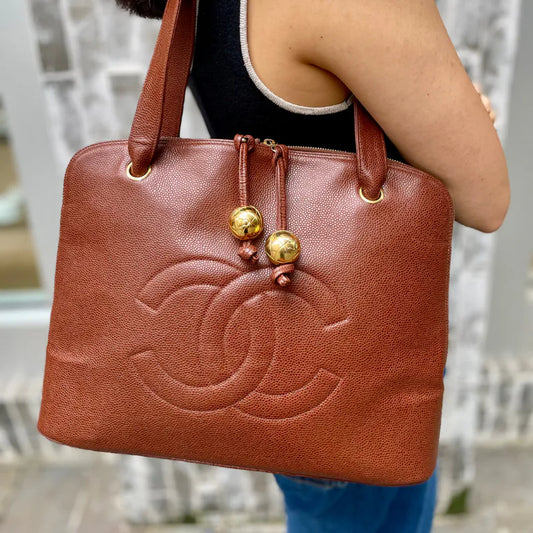 rb181-chanel-vintage-brown-caviar-leather-embroidered-logo-golden-ball-tote-bag