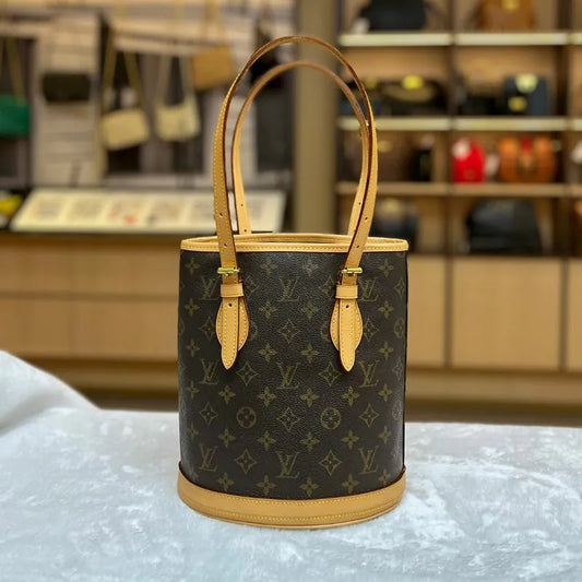 jw242-louis-vuitton-vintage-petite-monogram-bucket-bagrepaired-item