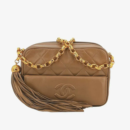 ra234-chanel-vintage-beige-lambskin-tassels-gold-chain-camera-bag