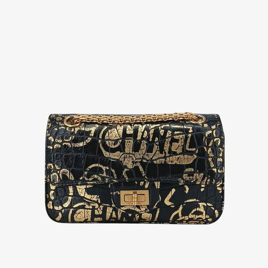 90190312-chanel-black-and-gold-graffiti-calfskin-crocodile-embossed-255-flap-bag