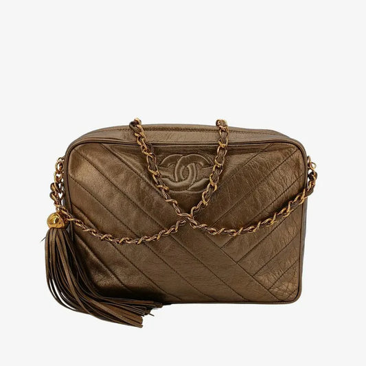 jah153-chanel-vintage-gold-lambskin-tassel-cross-stripe-camera-bag