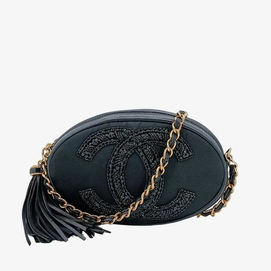js561-chanel-vintage-black-satin-oval-camera-bag