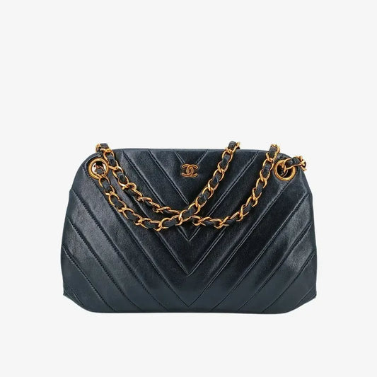 jt293-chanel-vintage-black-lambskin-chevron-handbag