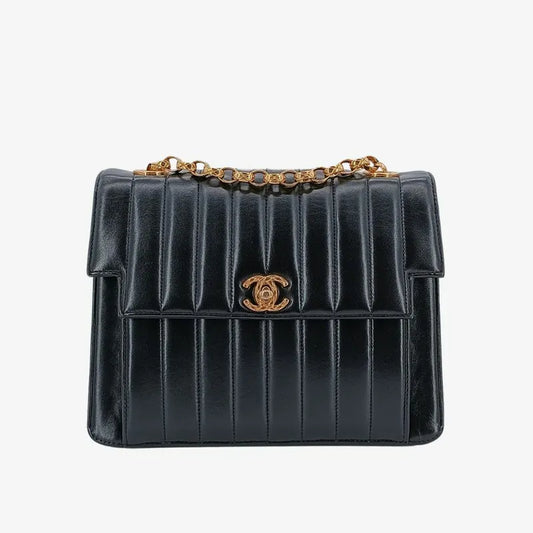 ju296-chanel-vintage-black-lambskin-vertical-gold-chain-flap-bag
