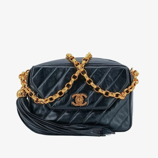 ra067-chanel-vintage-black-lambskin-tassels-gold-chain-camera-bag
