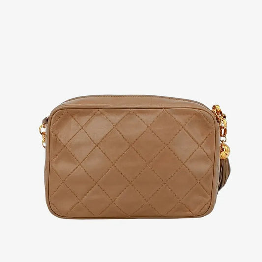 jah109-chanel-vintage-beige-lambskin-tassels-gold-chain-camera-bag