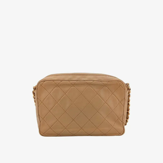 ju350-chanel-vintage-beige-lambskin-tassel-camera-bag