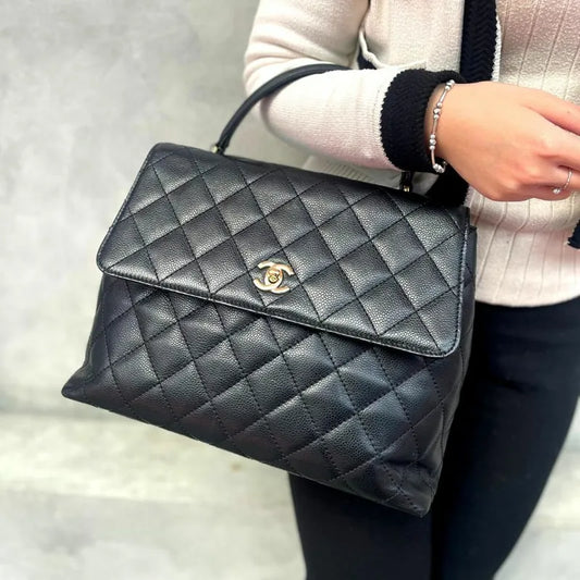 c412-chanel-vintage-black-caviar-leather-kelly-handbag