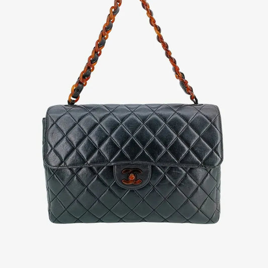 90201269-chanel-vintage-black-lambskin-tortoiseshell-quilted-flap-bag