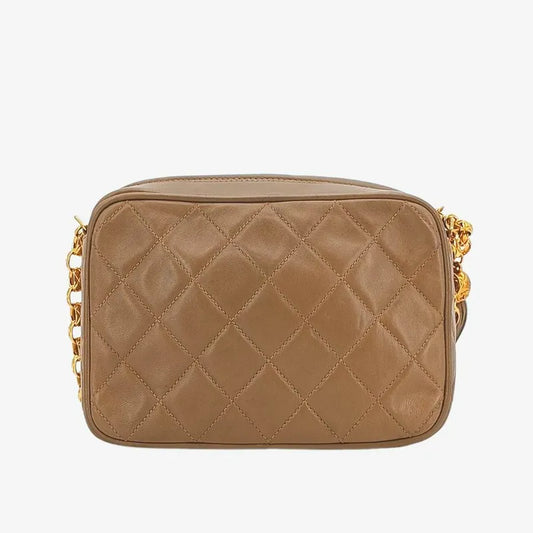 ra234-chanel-vintage-beige-lambskin-tassels-gold-chain-camera-bag