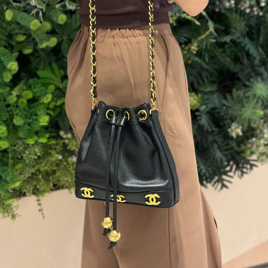 JW675 - CHANEL Vintage Black Caviar Leather Golden Ball Bucket Bag