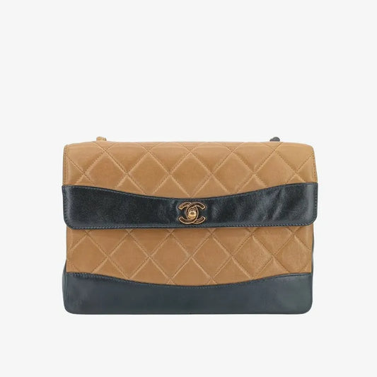 js364-chanel-vintage-bicolor-beige-black-lambskin-flap-bag