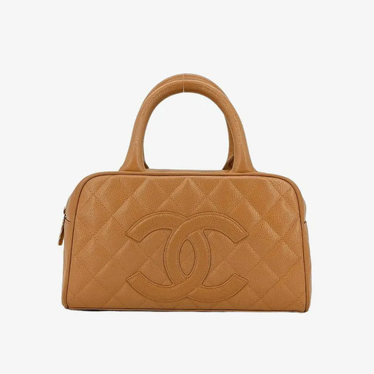 90197678-chanel-vintage-beige-caviar-leather-boston-bag