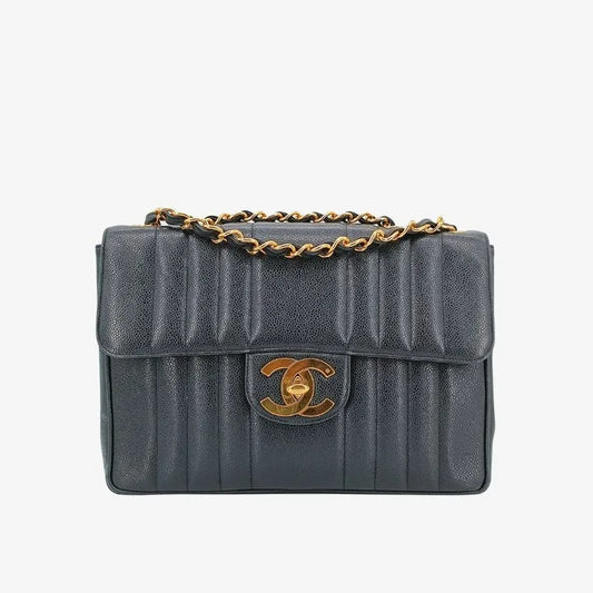 c377-chanel-vintage-black-caviar-leather-vertical-jumbo-flap-bag