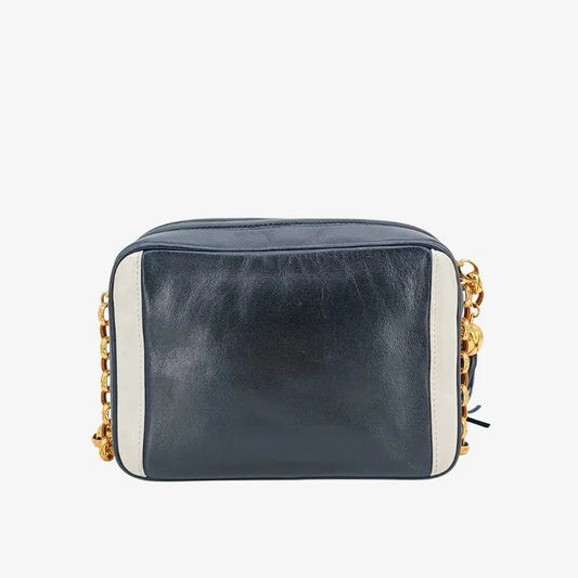 90204619-chanel-vintage-navy-white-lambskin-gold-chain-camera-bag