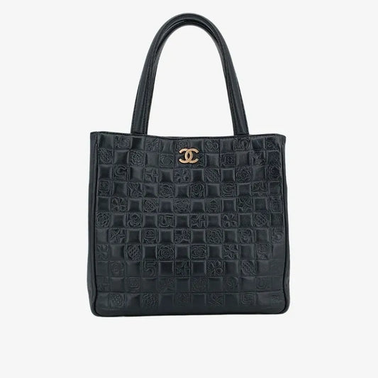 ra372-chanel-vintage-black-lambskin-precious-symbols-embossed-tote-bag