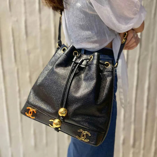 js663-chanel-vintage-black-caviar-leather-gold-ball-bucket-bag