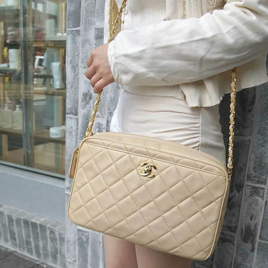 js006-chanel-vintage-beige-lambskin-quilted-camera-bag